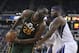 March 22, 2012; Sacramento, CA, USA; Utah Jazz center Al Jefferson (25) drives in against Sacramento Kings power forward DeMarcus Cousins (15) during the third quarter at Power Balance Pavilion. The Utah Jazz defeated the Sacramento Kings 103-102. Mandatory Credit: Kelley L Cox-USA TODAY Sports
