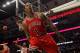 CHICAGO, IL - MARCH 12: Derrick Rose #1 of the Chicago Bulls lets out a scream after dunking the ball against the New York Knicks at the United Center on March 12, 2012 in Chicago, Illinois. The Bulls defeated the Knicks 104-99. NOTE TO USER: User expressly acknowledges and agrees that, by downloading and or using this photograph, User is consenting to the terms and conditions of the Getty Images License Agreement. (Photo by Jonathan Daniel/Getty Images)