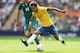 LONDON, ENGLAND - AUGUST 11: Neymar of Brazil (R) controls the ball under pressure from Jorge Enriquez of Mexico during the Men's Football Final between Brazil and Mexico on Day 15 of the London 2012 Olympic Games at Wembley Stadium on August 11, 2012 in London, England. (Photo by Julian Finney/Getty Images)