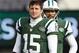 EAST RUTHERFORD, NJ - DECEMBER 23: Quarterbacks Tim Tebow #15 and Mark Sanchez #6, look on as teammate Greg McElroy #14 of the New York Jets passes before the start of their game against the San Diego Chargers at MetLife Stadium on December 23, 2012 in East Rutherford, New Jersey. (Photo by Rich Schultz/Getty Images)