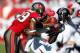 TAMPA, FL - NOVEMBER 25: Receiver Julio Jones #11 of the Atlanta Falcons catches a pass in front of defender Leonard Johnson #29 of the Tampa Bay Buccaneers during the game at Raymond James Stadium on November 25, 2012 in Tampa, Florida. (Photo by J. Meric/Getty Images)