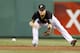 PITTSBURGH, PA - SEPTEMBER 7: Brock Holt #2 of the Pittsburgh Pirates fields a ground ball against the Chicago Cubs during the game on September 7, 2012 at PNC Park in Pittsburgh, Pennsylvania. (Photo by Justin K. Aller/Getty Images)