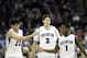 Dec 9, 2012; Omaha, NE, USA; Creighton Bluejays guard Avergy Dingman (22) and forward Doug McDermott (3) and guard Austin Chatman (1) celebrate during the the second half against the Akron Zips at the CenturyLink Center. Creighton defeated Akron 77-61. Mandatory Credit: Matt Ryerson-USA TODAY Sports