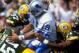 6 Sep 1998: Quarterback Scott Mitchell #19 of the Detroit Lions fumbles the ball during a game against the Green Bay Packers at Lambeau Field in Green Bay, Wisconsin. The Packers defeated the Lions 38-19. Mandatory Credit: Tom Hauck /Allsport