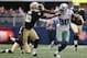 ARLINGTON, TX - DECEMBER 23: Dez Bryant #88 of the Dallas Cowboys runs for a touchdown past Isa Abdul-Quddus #42 of the New Orleans Saints at Cowboys Stadium on December 23, 2012 in Arlington, Texas. (Photo by Ronald Martinez/Getty Images)