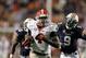 Nov 10, 2012; Auburn, AL, USA: Georgia Bulldogs tailback Keith Marshall (4) gets past Auburn Tigers defensive back Joshua Holsey (15) and defensive back Jermaine Whitehead (9) during the second half at Jordan-Hare Stadium. Mandatory Credit: John Reed-USA TODAY Sports