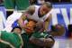 March 12, 2012; Los Angeles, CA, USA; Los Angeles Clippers small forward Caron Butler (5) and Boston Celtics power forward Kevin Garnett (5) battle for the ball during the first quarter of the game at the Staples Center. Mandatory Credit: Jayne Kamin-Oncea-USA TODAY Sports