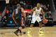 Dec 22, 2012; Brooklyn, NY, USA; Manhattan Jaspers guard RaShawn Stores (12) dribbles against South Carolina Gamecocks guard Eric Smith (5) during the first half of the Brooklyn Hoops Holiday Invitational at the Barclays Center. Mandatory Credit: Joe Camporeale-USA TODAY Sports