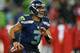 SEATTLE, WA - DECEMBER 23: Quarterback Russell Wilson #3 of the Seattle Seahawks looks downfield to pass against the San Francisco 49ers at CenturyLink Field on December 23, 2012 in Seattle, Washington. (Photo by Otto Greule Jr/Getty Images)