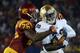 LOS ANGELES, CA - NOVEMBER 24: Cierre Wood #20 of the Notre Dame Fighting Irish protects the ball as he is tackled by Josh Shaw #26 of the USC Trojans during a 22-13 Notre Dame win at Los Angeles Memorial Coliseum on November 24, 2012 in Los Angeles, California. (Photo by Harry How/Getty Images)