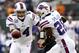 EAST RUTHERFORD, NJ - NOVEMBER 27: Ryan Fitzpatrick #14 of the Buffalo Bills hands off to C.J. Spiller #28 during their game against the New York Jets at MetLife Stadium on November 27, 2011 in East Rutherford, New Jersey. (Photo by Jeff Zelevansky/Getty Images)