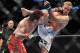 PORTLAND, OR - AUGUST 29: UFC fighter Chris Leben (L) battles UFC fighter Jake Rosholt (R) during their Middleweight bout at UFC 102: Couture vs. Nogueira at the Rose Garden Arena on August 29, 2009 in Portland, Oregon. (Photo by Jon Kopaloff/Getty Images)