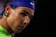 MELBOURNE, AUSTRALIA - JANUARY 29: Rafael Nadal of Spain looks on in his men's final match against Novak Djokovic of Serbia during day fourteen of the 2012 Australian Open at Melbourne Park on January 29, 2012 in Melbourne, Australia. (Photo by Scott Barbour/Getty Images)