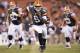 CLEVELAND, OH - AUGUST 30: Quarterback Thaddeus Lewis #9 of the Cleveland Browns scrambles for an 18-yard gain during during the fourth quarter of a preseason game against the Chicago Bears at Cleveland Browns Stadium on August 30, 2012 in Cleveland, Ohio. (Photo by Jason Miller/Getty Images)