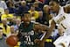 November 13, 2012; Ann Arbor, MI, USA; Cleveland State Vikings guard Charlie Lee (31) is defended by Michigan Wolverines forward Glenn Robinson III (1) in the second half of a preseason NIT game at Crisler Center. Michigan won 77-47. Mandatory Credit: Rick Osentoski-USA TODAY Sports