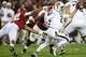 TUSCALOOSA, AL - NOVEMBER 10: Quarterback Johnny Manziel #2 ofthe Texas A&M Aggies breaks away from linebacker Adrian Hubbard #42 of the Alabaman Crimson Tide during the game at Bryant-Denny Stadium on November 10, 2012 in Tuscaloosa, Alabama. (Photo by Mike Zarrilli/Getty Images)