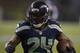 SEATTLE, WA - DECEMBER 23: Marshawn Lynch #24 of the Seattle Seahawks rushes the ball during a game agains the San Francisco 49ers at CenturyLink Field on December 23, 2012 in Seattle, Washington. (Photo by Stephen Brashear/Getty Images)
