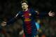 BARCELONA, SPAIN - DECEMBER 16: Lionel Messi of Barcelona celebrates scoring his sides third goal during the la Liga match between FC Barcelona and Club Atletico de Madrid at the Camp Nou stadium on December 16, 2012 in Barcelona, Spain. (Photo by Jasper Juinen/Getty Images)