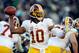 PHILADELPHIA, PA - DECEMBER 23: Robert Griffin III #10 of the Washington Redskins throws a pass against the Philadelphia Eagles during a game at Lincoln Financial Field on December 23, 2012 in Philadelphia, Pennsylvania. (Photo by Patrick McDermott/Getty Images)
