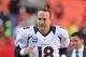 Nov 25, 2012; Kansas City, MO, USA; Denver Broncos quarterback Peyton Manning (18) leaves the field after the game against the Kansas City Chiefs at Arrowhead Stadium. Denver won the game 17-9. Mandatory Credit: John Rieger-USA TODAY Sports