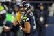 SEATTLE, WA. - DECEMBER 23: Quarterback Russell Wilson #3 of the Seattle Seahawks drops back to pass during the fourth quarter of the game at CenturyLink Field on December 23, 2012 in Seattle,Wa. The Seahawks won the game 42-13. (Photo by Steve Dykes/Getty Images)