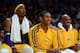 LOS ANGELES, CA - DECEMBER 28: (L-R) Dwight Howard #12, Metta World Peace #15 and Kobe Bryant #24 of the Los Angeles Lakers smile on the bench during the game against the Portland Trail Blazers at Staples Center on December 28, 2012 in Los Angeles, California. The Lakers won 104-87. NOTE TO USER: User expressly acknowledges and agrees that, by downloading and or using this photograph, User is consenting to the terms and conditions of the Getty Images License Agreement. (Photo by Harry How/Getty Images)