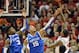 Dec 29, 2012; Louisville, KY, USA; Louisville Cardinals forward Chane Behanan (21) shoots against Kentucky Wildcats forward Willie Cauley-Stein (15) and forward Nerlens Noel (3) during the first half at the KFC Yum! Center. Mandatory Credit: Jamie Rhodes-USA TODAY Sports