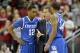Dec 29, 2012; Louisville, KY, USA; Kentucky Wildcats head coach John Calipari talks with guard Ryan Harrow (12) and guard Julius Mays (34) during the first half against the Louisville Cardinals at the KFC Yum! Center. Mandatory Credit: Jamie Rhodes-USA TODAY Sports