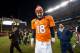 DENVER, CO - DECEMBER 23: Quarterback Peyton Manning #18 of the Denver Broncos walks out to shake hands with members of the Cleveland Browns after a game at Sports Authority Field at Mile High on December 23, 2012 in Denver, Colorado. The Broncos defeated the Browns 34-12. (Photo by Dustin Bradford/Getty Images)