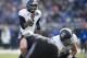 FORT WORTH, TX - DECEMBER 29: Driphus Jackson #6 of the Rice Owls calls a play at the line of scrimmage against the Air Force Falcons on December 29, 2012 during the Bell Helicopter Armed Forces Bowl at Amon G. Carter Stadium in Fort Worth, Texas. (Photo by Cooper Neill/Getty Images)