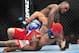 Dec 29, 2012; Las Vegas, NV, USA; Derek Brunson (top) strikes Chris Leban (bottom) during UFC 155 at the MGM Grand Garden Arena. Mandatory Credit: Gary A. Vasquez-USA TODAY Sports