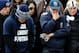 STATE COLLEGE, PA - JANUARY 22: A student cannot hold back his emotions as he and others in the community pay their respects at the statue of Joe Paterno, the former Penn State football coach, after hearing of Paterno's death, outside of Beaver Stadium on January 22, 2012 in State College, Pennsylvania. Paterno, who was 85, died due to complications from lung cancer. (Photo by Patrick Smith/Getty Images)