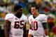 COLUMBIA, MO - OCTOBER 13: Quarterback AJ McCarron #10 of the Alabama Crimson Tide jokes with offensive linesman Chance Warmack #65 prior to the game against the Missouri Tigers at Faurot Field/Memorial Stadium on October 13, 2012 in Columbia, Missouri. (Photo by Jamie Squire/Getty Images)