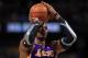 DENVER, CO - DECEMBER 26: Dwight Howard #12 of the Los Angeles Lakers takes a free throw against the Denver Nuggets at Pepsi Center on December 26, 2012 in Denver, Colorado. The Nuggets defeated the Lakers 126-114. NOTE TO USER: User expressly acknowledges and agrees that, by downloading and or using this photograph, User is consenting to the terms and conditions of the Getty Images License Agreement. (Photo by Doug Pensinger/Getty Images)