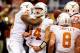 SAN ANTONIO, TX - DECEMBER 29: David Ash #14 of the University of Texas Longhorns celebrates a touchdown against the Oregon State Beavers during the Valero Alamo Bowl at the Alamodome on December 29, 2012 in San Antonio, Texas. Texas won the game 31-27. (Photo by Stacy Revere/Getty Images)