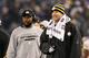 BALTIMORE, MD - DECEMBER 02: Head coach Mike Tomlin of the Pittsburgh Steelers and Ben Roethlisberger #7 look on from the sidelines after the Steelers scored on the Baltimore Ravens during the third quarter of their 23-20 win at M&T Bank Stadium on December 2, 2012 in Baltimore, Maryland. (Photo by Rob Carr/Getty Images)
