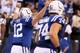Andrew Luck runs downfield to celebrate a 70-yard touchdown pass to T.Y. Hilton.