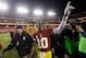 LANDOVER, MD - DECEMBER 30: Quarterback Robert Griffin III #10 of the Washington Redskins celebrates after the Redskins defeated the Dallas Cowboys 28-18 at FedExField on December 30, 2012 in Landover, Maryland. (Photo by Rob Carr/Getty Images)