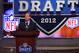 NEW YORK, NY - APRIL 26: NFL Commissioner Roger Goodell speaks at the podium on stare during the first round of the 2012 NFL Draft at Radio City Music Hall on April 26, 2012 in New York City. (Photo by Chris Chambers/Getty Images)