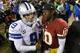 LANDOVER, MD - DECEMBER 30: Quarterbacks Tony Romo #9 of the Dallas Cowboys and Robert Griffin III #10 of the Washington Redskins talk following the Redskins 28-18 win at FedExField on December 30, 2012 in Landover, Maryland. (Photo by Rob Carr/Getty Images)