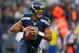 SEATTLE, WA - DECEMBER 30: Quarterback Russell Wilson #3 of the Seattle Seahawks rolls out to pass against the St. Louis Rams at CenturyLink Field on December 30, 2012 in Seattle, Washington. The Seahawks defeated the Rams 20-13. (Photo by Otto Greule Jr/Getty Images)