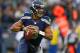 SEATTLE, WA - DECEMBER 30: Quarterback Russell Wilson #3 of the Seattle Seahawks rolls out to pass against the St. Louis Rams at CenturyLink Field on December 30, 2012 in Seattle, Washington. The Seahawks defeated the Rams 20-13. (Photo by Otto Greule Jr/Getty Images)