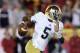 LOS ANGELES, CA - NOVEMBER 24: Quarterback Everett Golson #5 of the Notre Dame Fighting Irish carries the ball against the USC Trojans at Los Angeles Memorial Coliseum on November 24, 2012 in Los Angeles, California. (Photo by Jeff Gross/Getty Images)