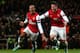 Theo Walcott (L) and Olivier Giroud (R) of Arsenal