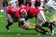 ATLANTA, GA - NOVEMBER 26: Tevin Washington #13 of the Georgia Tech Yellow Jackets is sacked by John Jenkins #6 and Jarvis Jones #29 of the Georgia Bulldogs at Bobby Dodd Stadium on November 26, 2011 in Atlanta, Georgia. (Photo by Scott Cunningham/Getty Images)