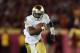 LOS ANGELES, CA - NOVEMBER 24: Quarterback Everett Golson #5 of the Notre Dame Fighting Irish carries the ball against the USC Trojans at Los Angeles Memorial Coliseum on November 24, 2012 in Los Angeles, California. (Photo by Jeff Gross/Getty Images)