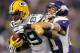 MINNEAPOLIS, MN - DECEMBER 30: Josh Robinson #21 of the Minnesota Vikings tackles James Jones #89 of the Green Bay Packers during the second quarter of the game on December 30, 2012 at Mall of America Field at the Hubert H. Humphrey Metrodome in Minneapolis, Minnesota. (Photo by Hannah Foslien/Getty Images)