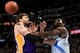 DENVER, CO - DECEMBER 26: Pau Gasol #16 of the Los Angeles Lakers and Kenneth Faried #35 of the Denver Nuggets battle for a loose ball at Pepsi Center on December 26, 2012 in Denver, Colorado. The Nuggets defeated the Lakers 126-114. NOTE TO USER: User expressly acknowledges and agrees that, by downloading and or using this photograph, User is consenting to the terms and conditions of the Getty Images License Agreement. (Photo by Doug Pensinger/Getty Images)