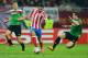 BUCHAREST, ROMANIA - MAY 09: Adrian Lopez of Atletico Madrid is challenged by Inigo Perez of Athletic Bilbao during the UEFA Europa League Final between Atletico Madrid and Athletic Bilbao at the National Arena on May 9, 2012 in Bucharest, Romania. (Photo by Shaun Botterill/Getty Images)