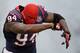 HOUSTON, TX - DECEMBER 23: Antonio Smith #94 of the Houston Texans enters the field prior to the start of the game against the Minnesota Vikings at Reliant Stadium on December 23, 2012 in Houston, Texas. (Photo by Scott Halleran/Getty Images)